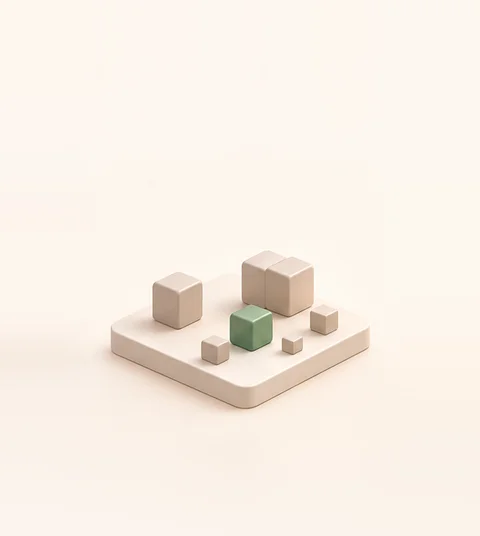 A small platform holding a few scattered blocks, one glowing green among plain ones.